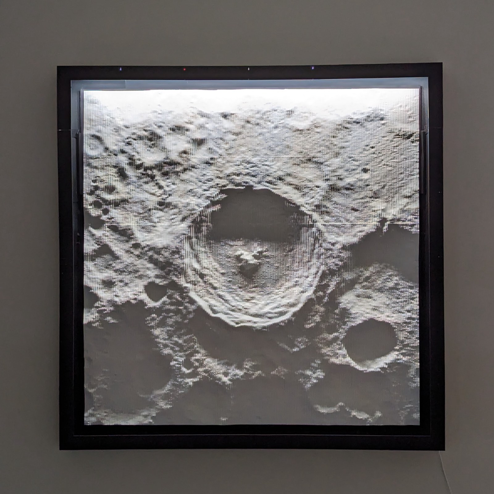 The lit lunar relief, front view